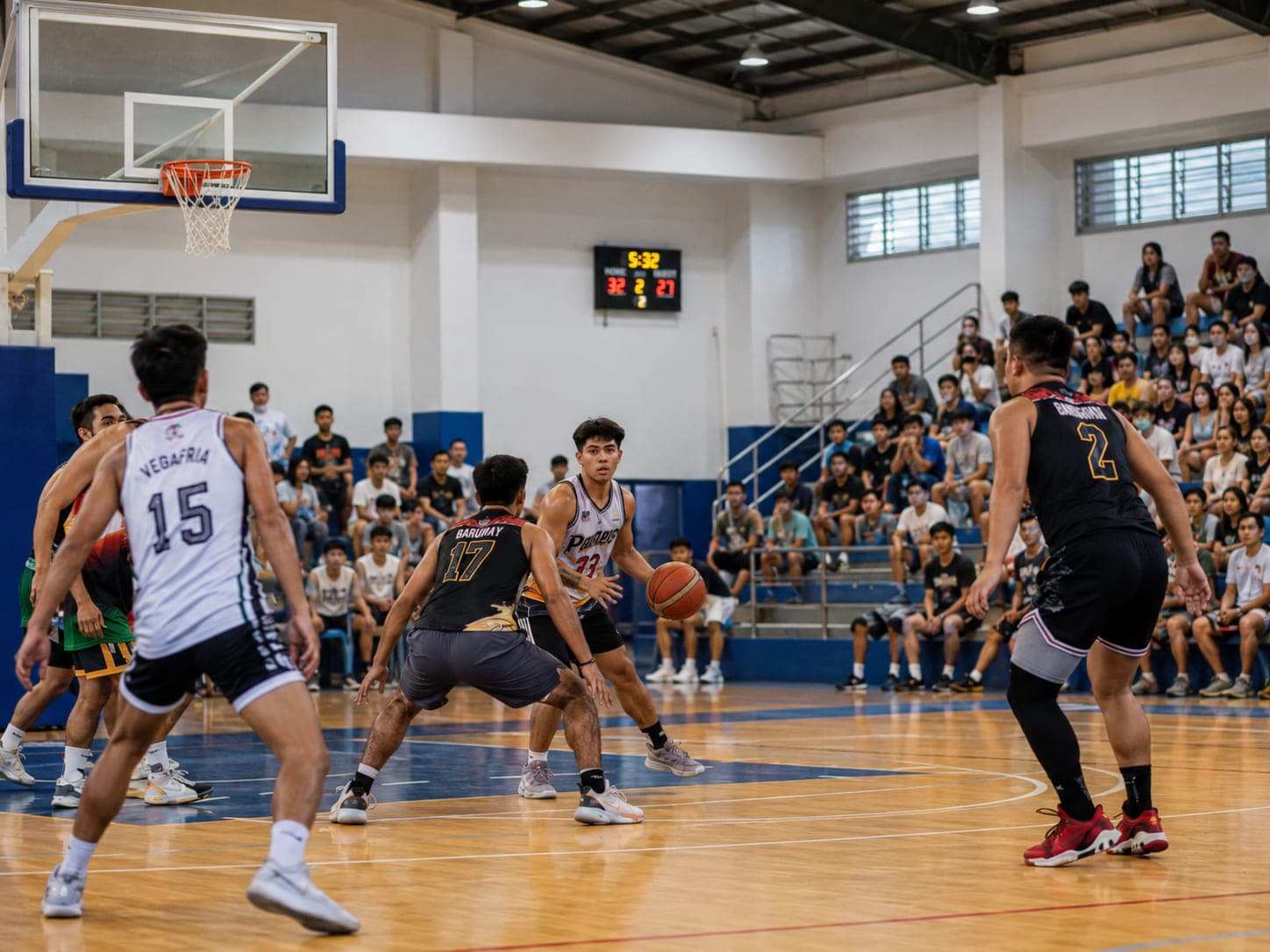 Players competing in a PlayLokal community basketball league game