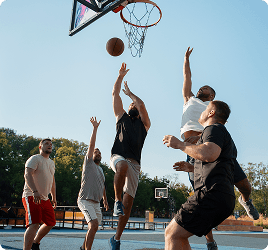 Basketball players jumping